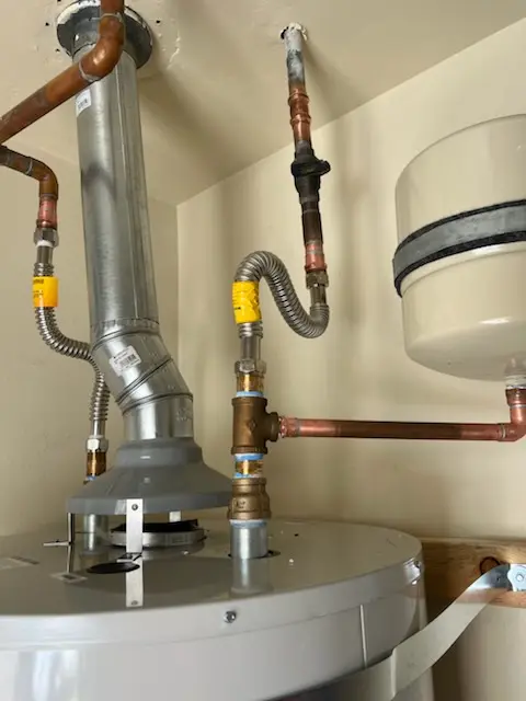 Water heater installation and plumbing repair in Kerrydale